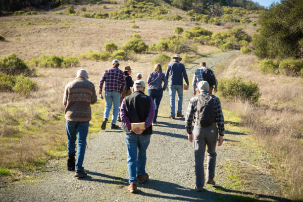 group of land owners on a walk