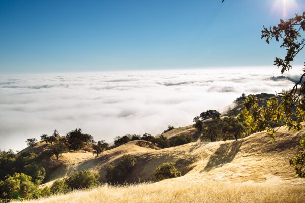 View from high on a hill looking out at the clouds