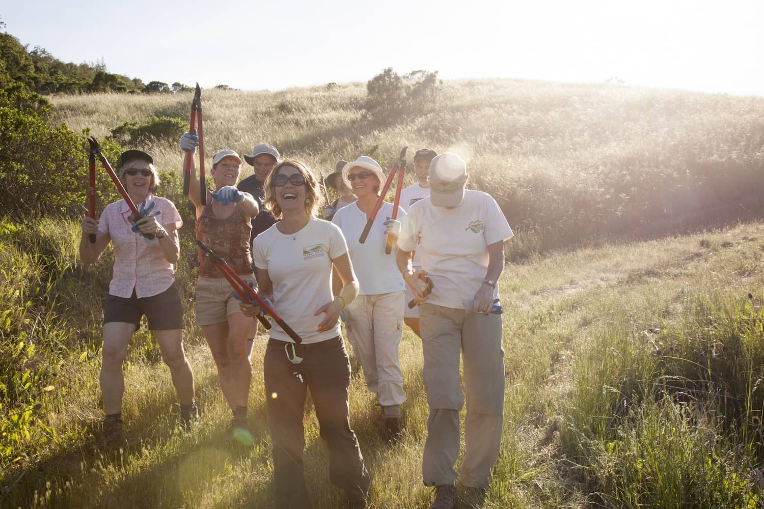 Volunteers with garden tools at saddle mountain