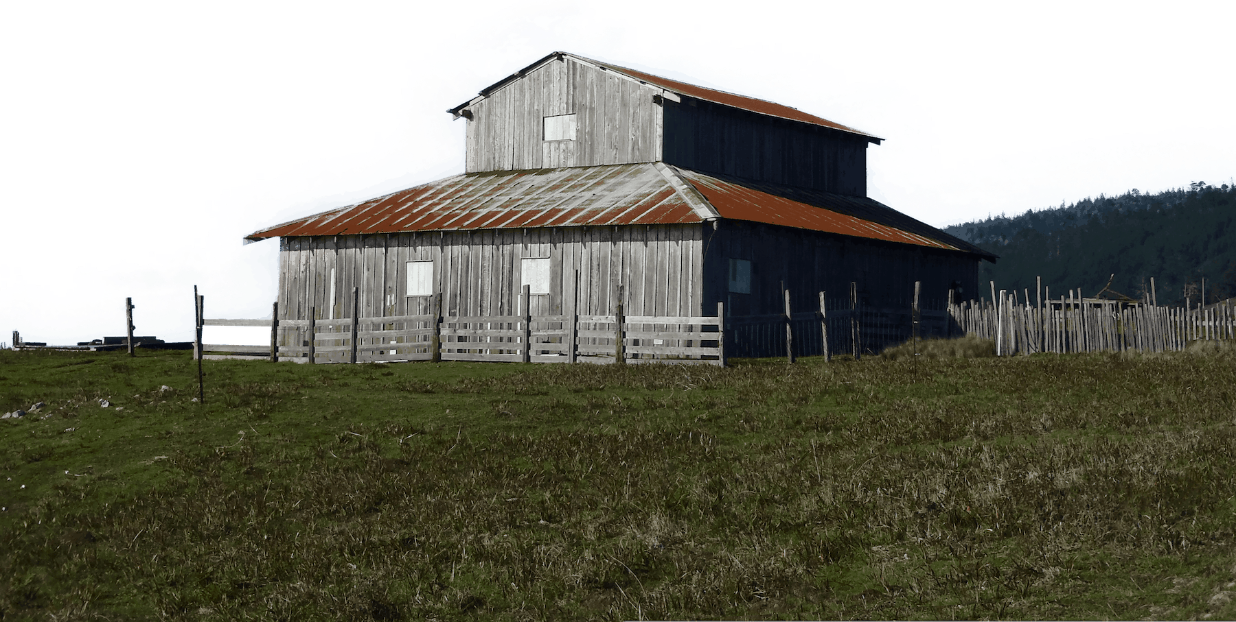 cut out image of a grey and red barn
