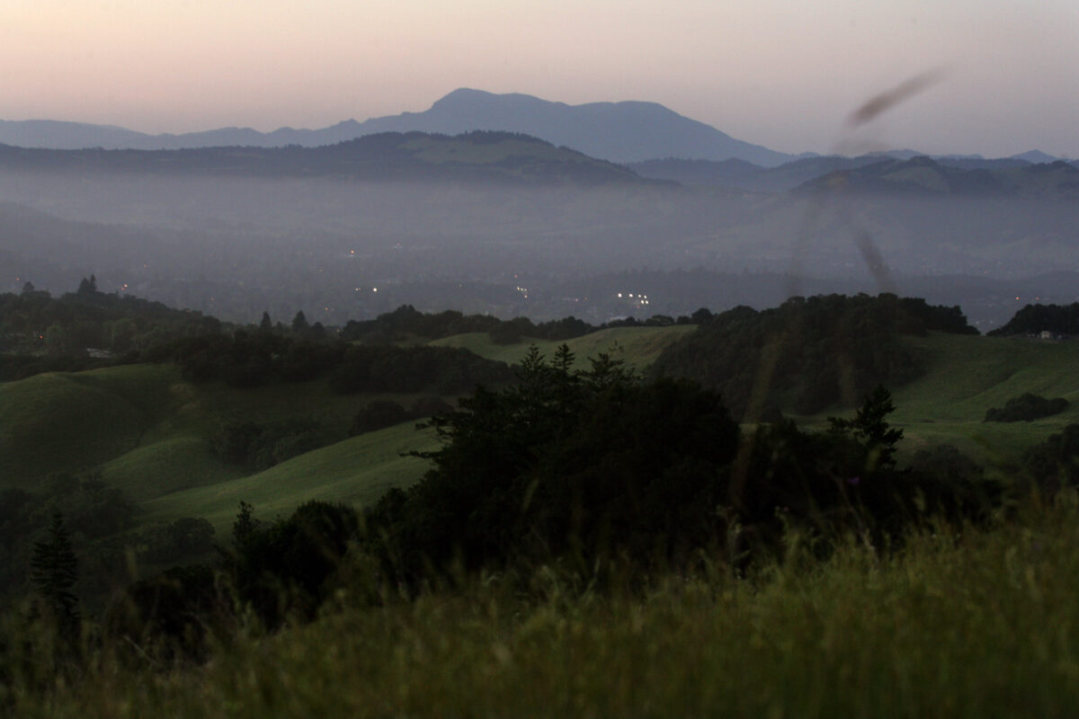 view of hills at sunset